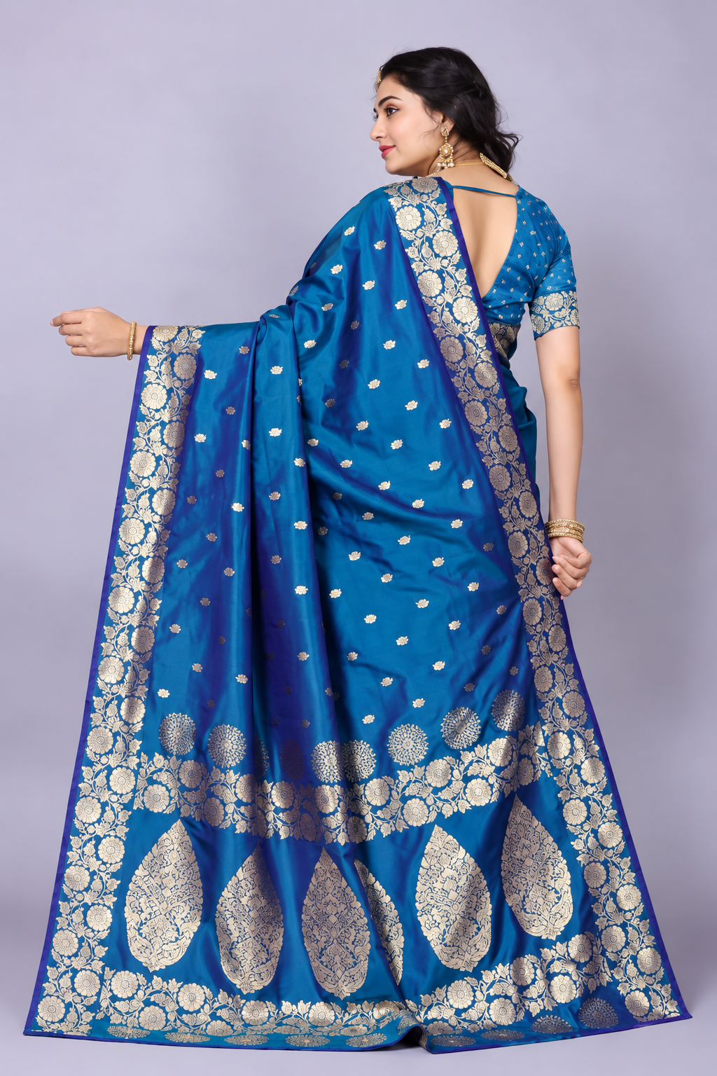Regal Peacock Blue Woven Banarasi Silk Saree with Rich Gold Zari Work